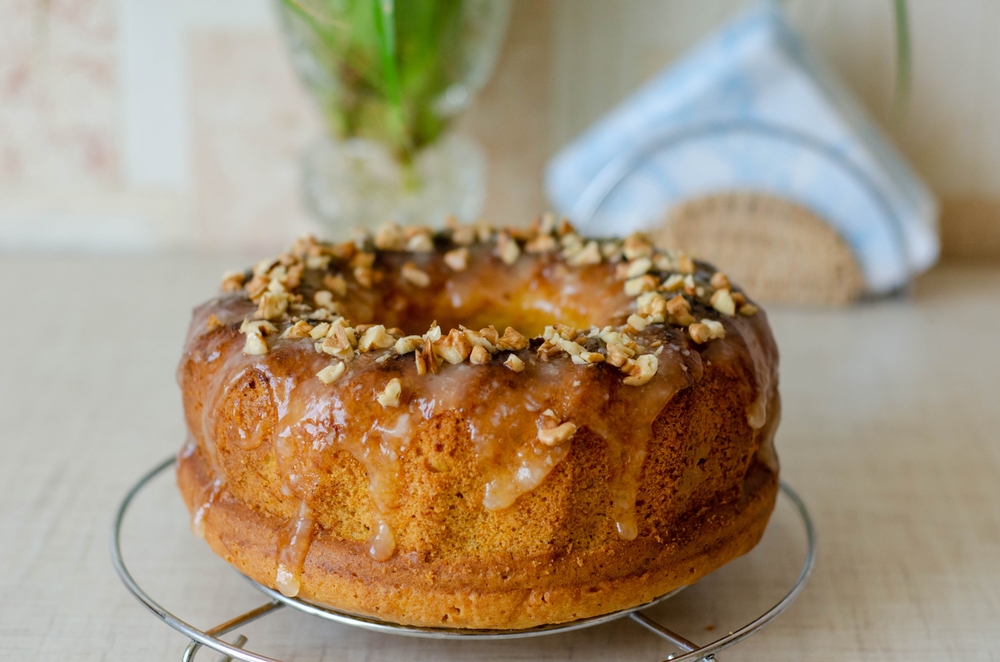 bunt cake with lemon topping and nuts