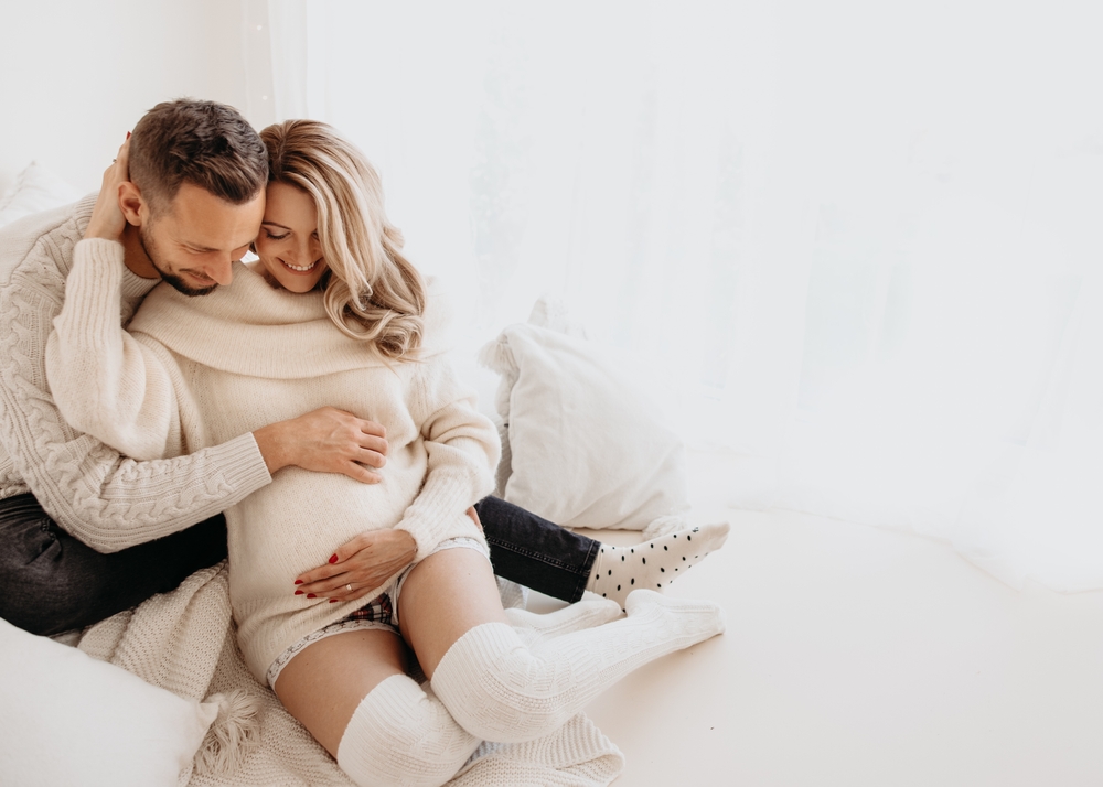 Maternity Photo of Couple on a bed