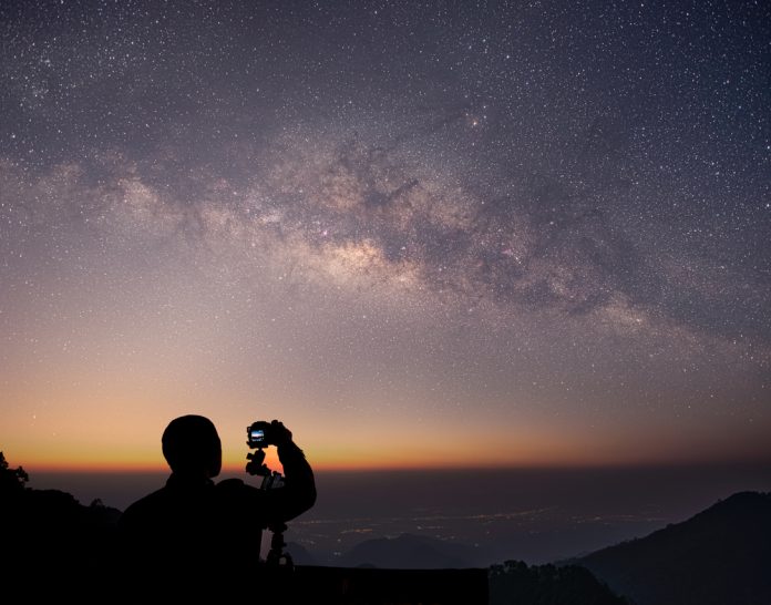 photographer shooting the stars and the milky way
