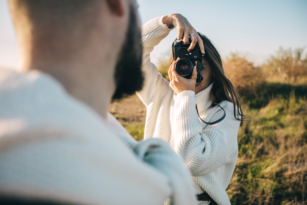 Photographer taking an outdoor portrait
