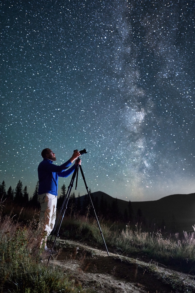 photographer taking photos of Milky Way