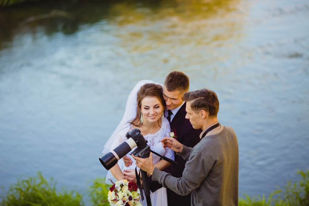 Wedding Photographer showing the bride and groom photos